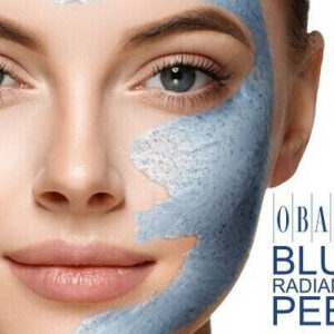 Close-up of a woman's face with a blue peel mask applied to the right half, promoting Obagi Blue Radiance Peel.